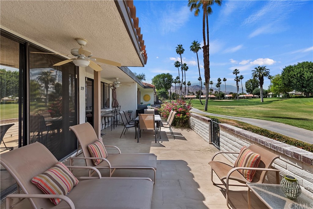 109 Torremolinos Drive Rancho Mirage, CA 92270 - Photo 31 of 33 a view of a patio with couches table and chairs