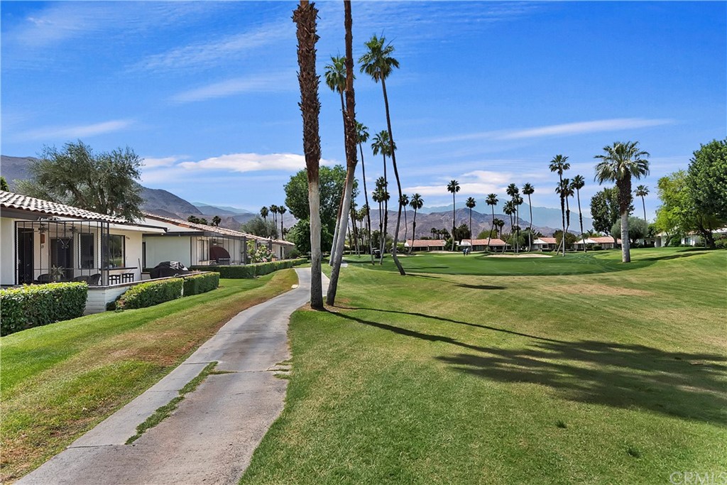 109 Torremolinos Drive Rancho Mirage, CA 92270 - Photo 33 of 33 a front view of a house with a garden