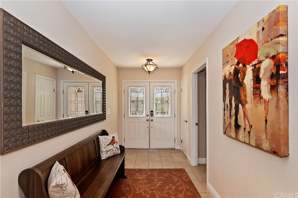 109 Torremolinos Drive Rancho Mirage, CA 92270 - Photo 5 of 33 a living room with furniture and wooden floor