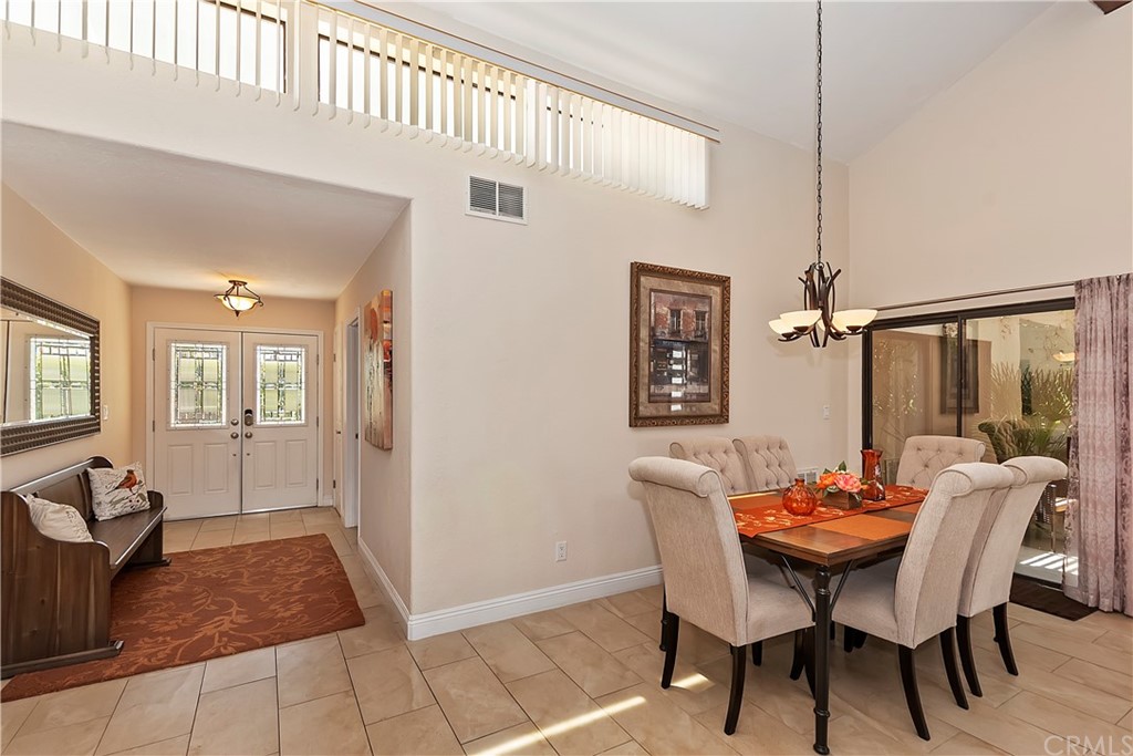109 Torremolinos Drive Rancho Mirage, CA 92270 - Photo 7 of 33 a view of a dining room with furniture