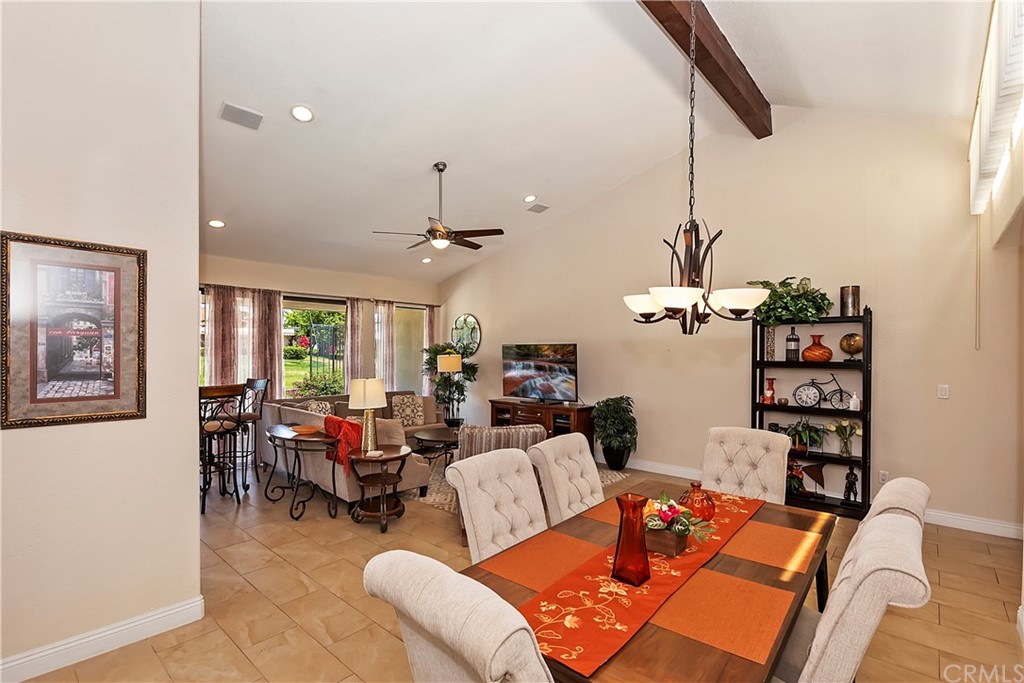 109 Torremolinos Drive Rancho Mirage, CA 92270 - Photo 8 of 33 a living room with furniture a dining table and chairs with wooden floor