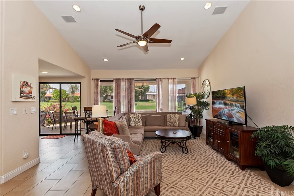 109 Torremolinos Drive Rancho Mirage, CA 92270 - Photo 9 of 33 a living room with furniture and a large window