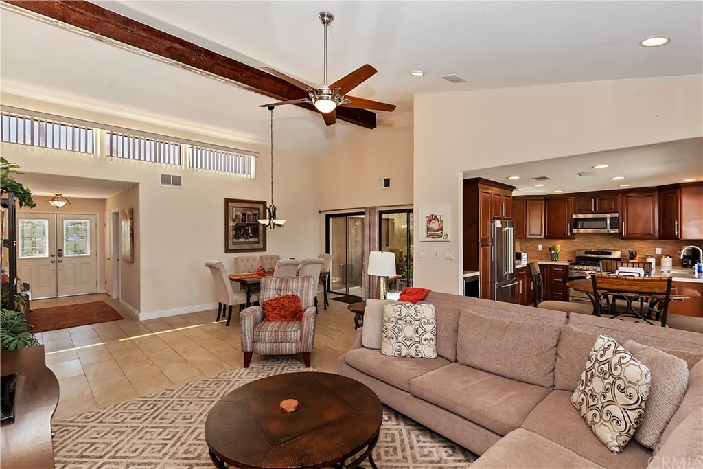 109 Torremolinos Drive Rancho Mirage, CA 92270 - Photo 10 of 33 a living room with furniture and a wooden floor