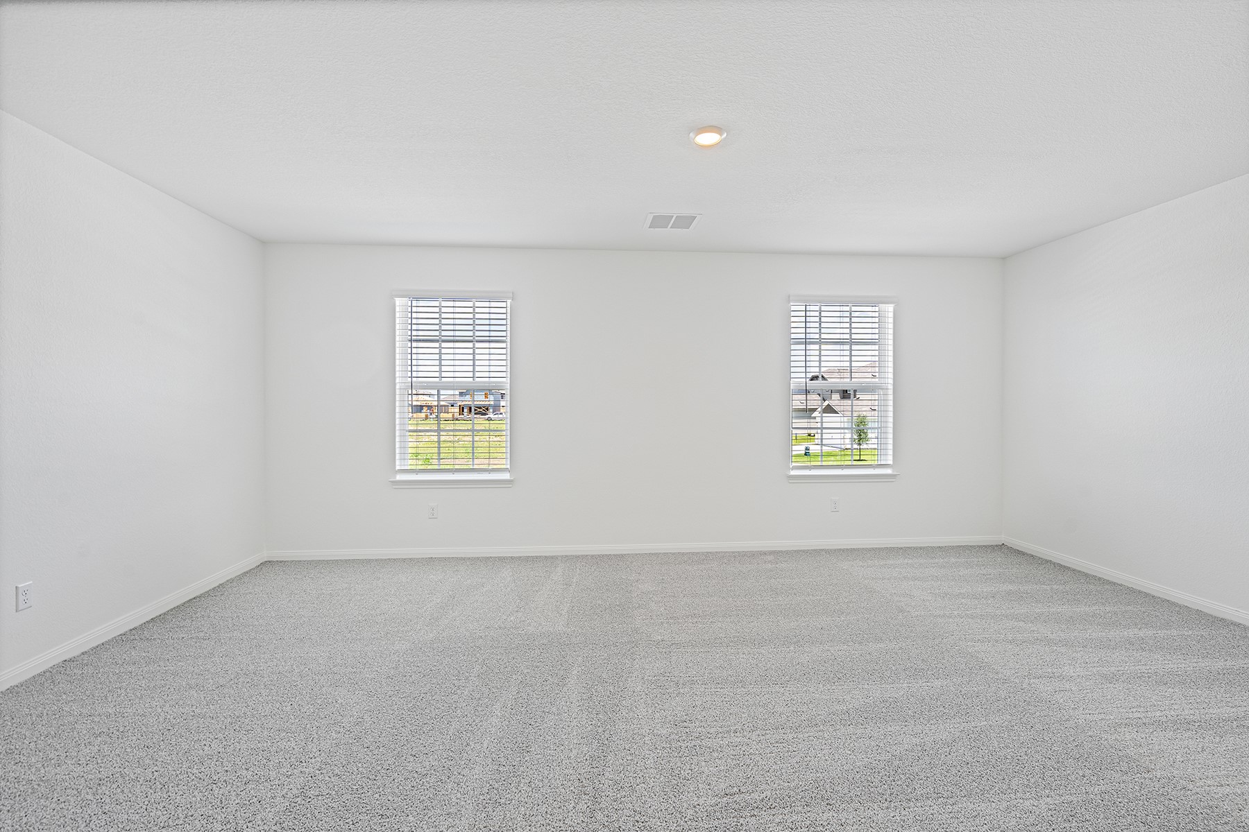 14524 Wahlbergs Way Elgin, TX 78621 - Photo 5 of 12 an empty room with windows