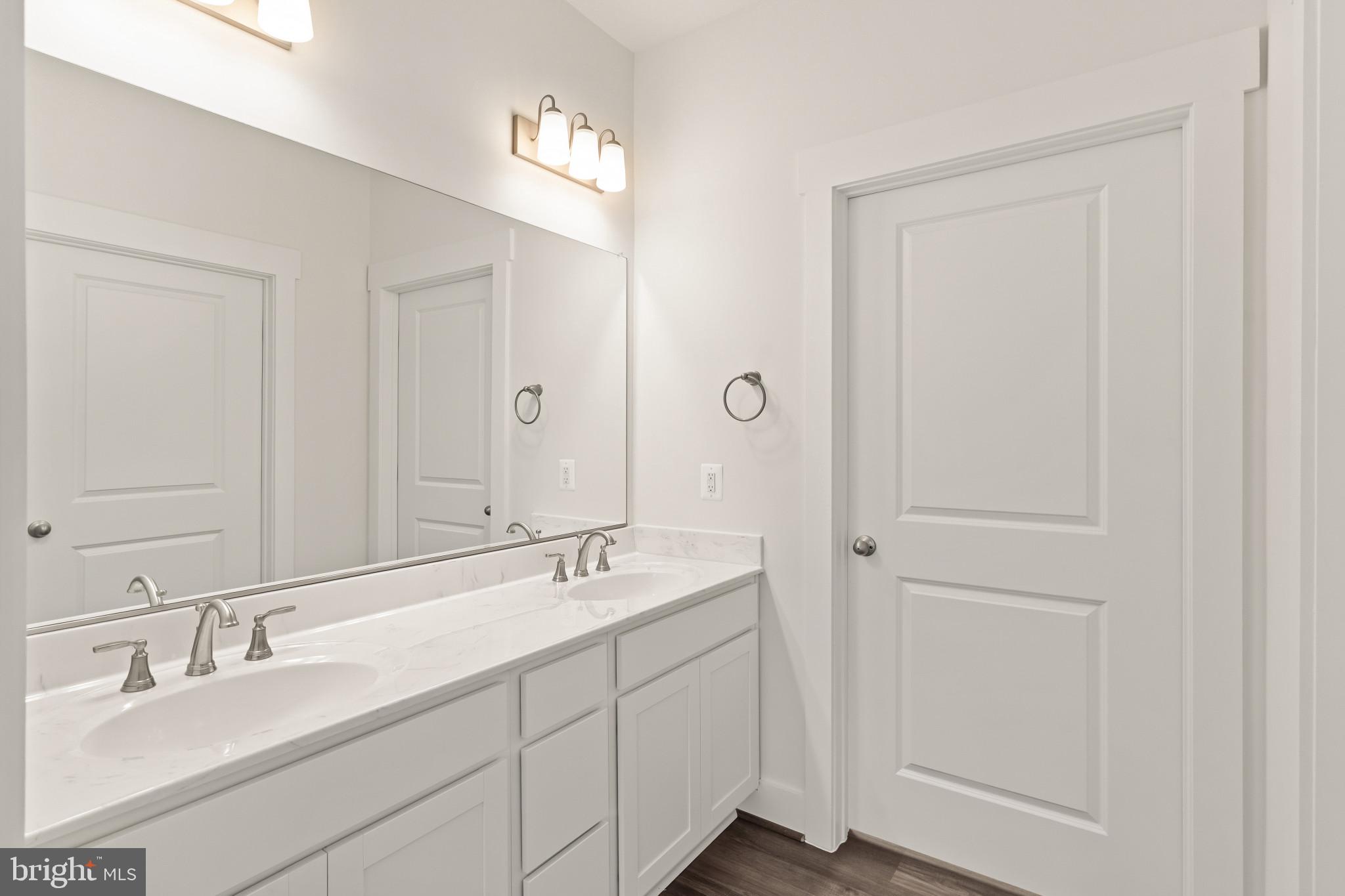 6735 Beverly Road Broad Run, VA 20137 - Photo 21 of 30 Full bathroom with double vanity and dark wood fin