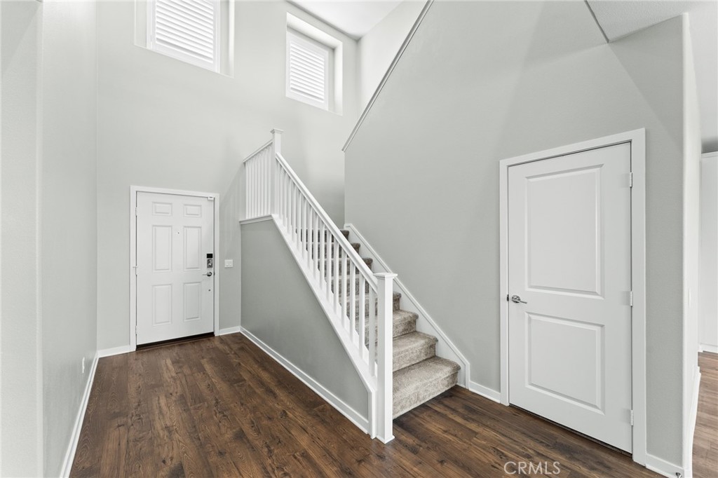 36772 Arietta Way Beaumont, CA 92223 - Photo 21 of 45 a view of entryway with wooden floor