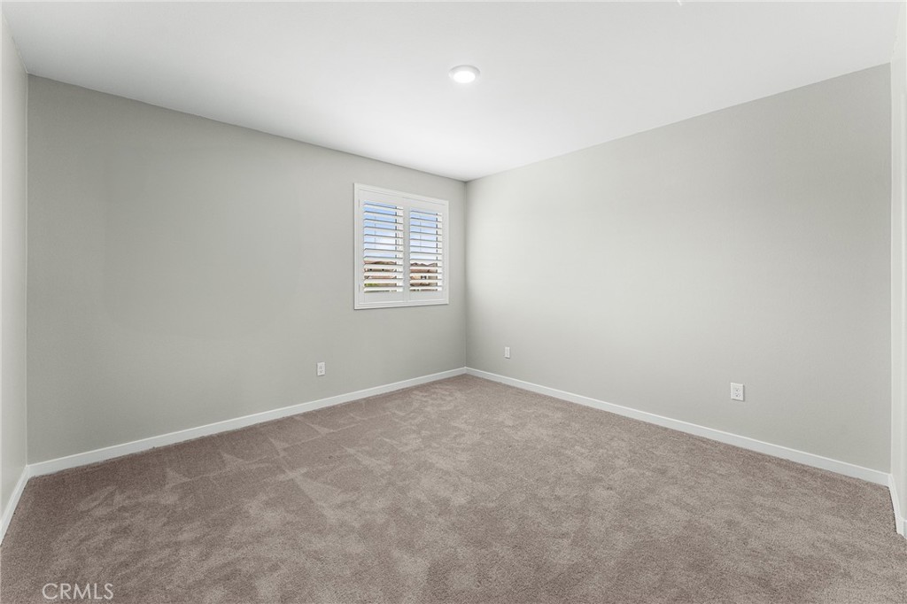 36772 Arietta Way Beaumont, CA 92223 - Photo 24 of 45 an empty room with a window