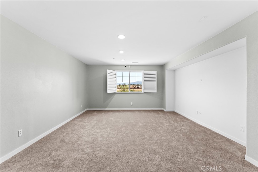 36772 Arietta Way Beaumont, CA 92223 - Photo 26 of 45 an empty room with a window
