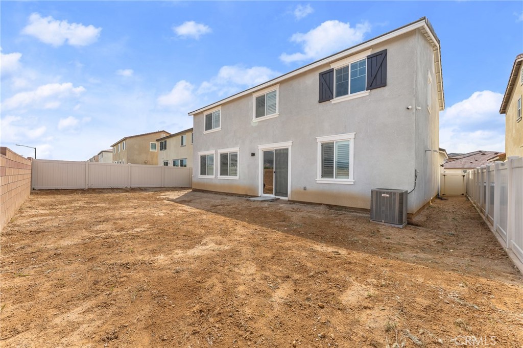36772 Arietta Way Beaumont, CA 92223 - Photo 44 of 45 a house view with a backyard space