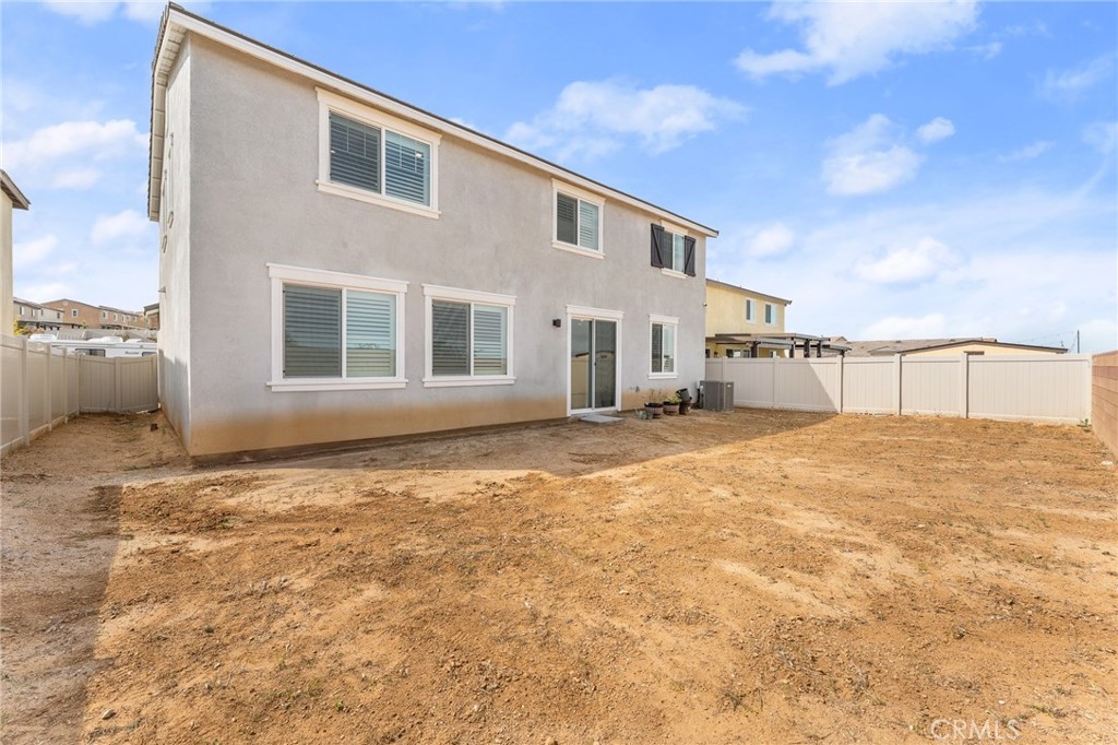 36772 Arietta Way Beaumont, CA 92223 - Photo 45 of 45 a view of a house with a backyard