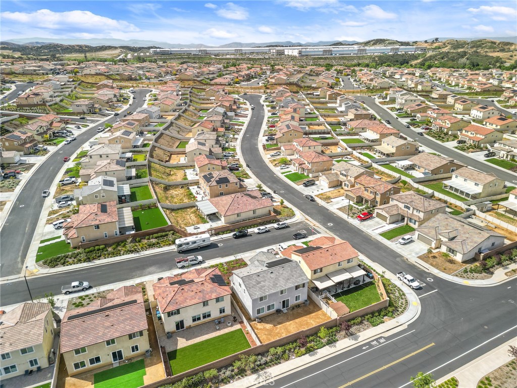 36772 Arietta Way Beaumont, CA 92223 - Photo 10 of 45 an aerial view of residential houses with outdoor space