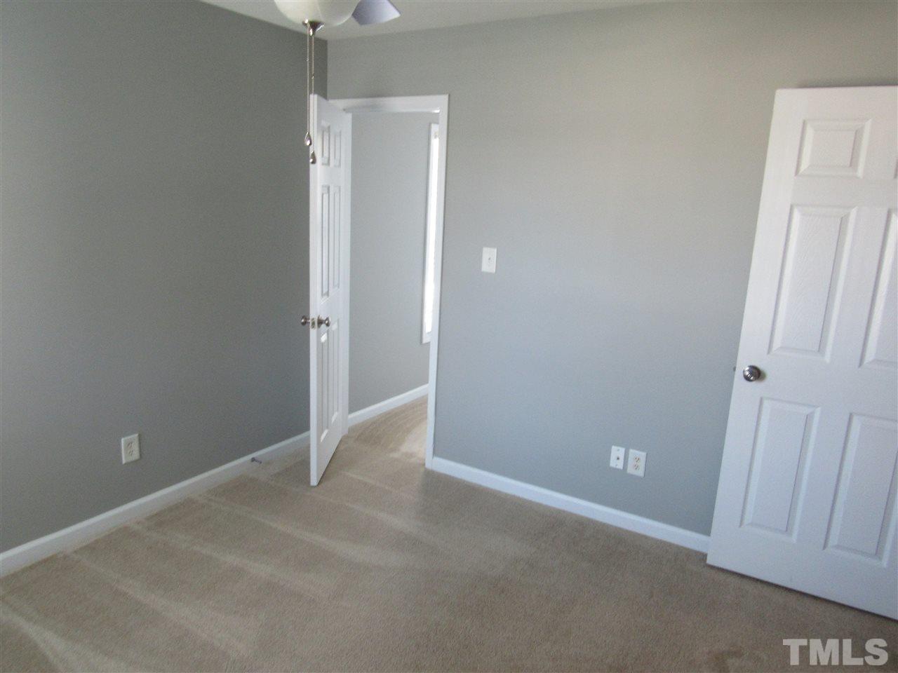 5912 Wynmore Road Raleigh, NC 27610 - Photo 22 of 25 a view of an empty room