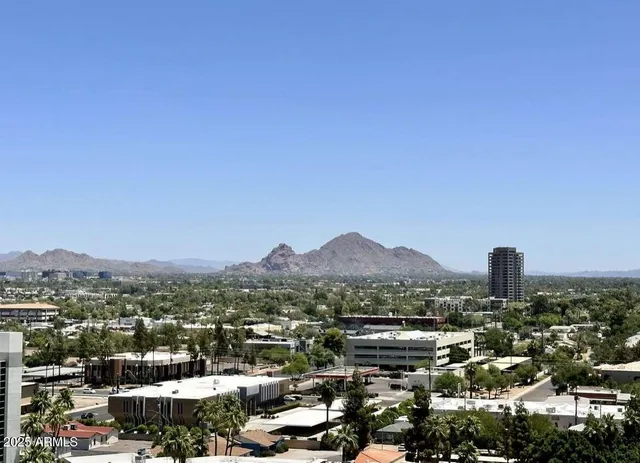 a room with gym equipment and a large window