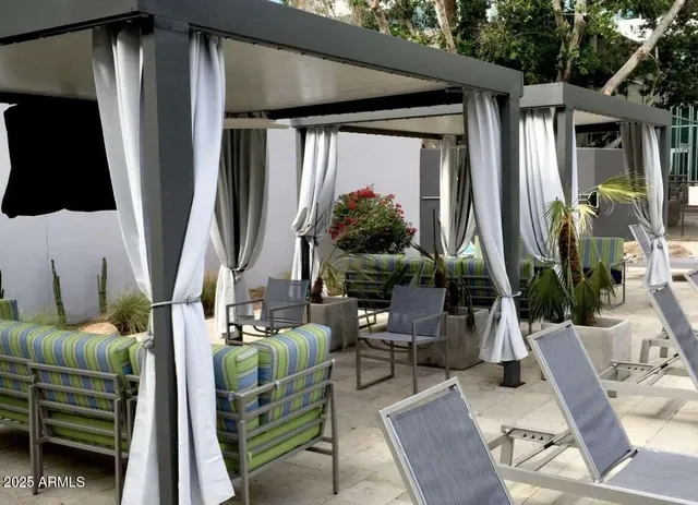 a view of a hallway with chandelier