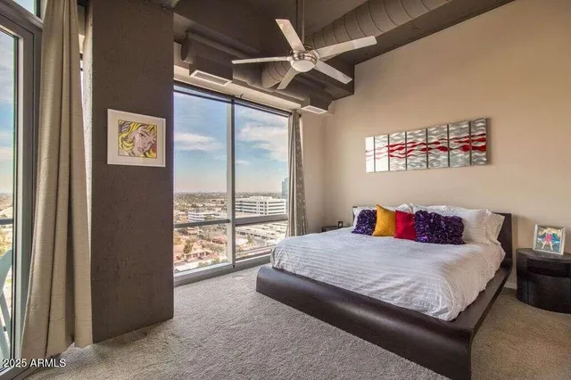 a view of livingroom with furniture and cabinet
