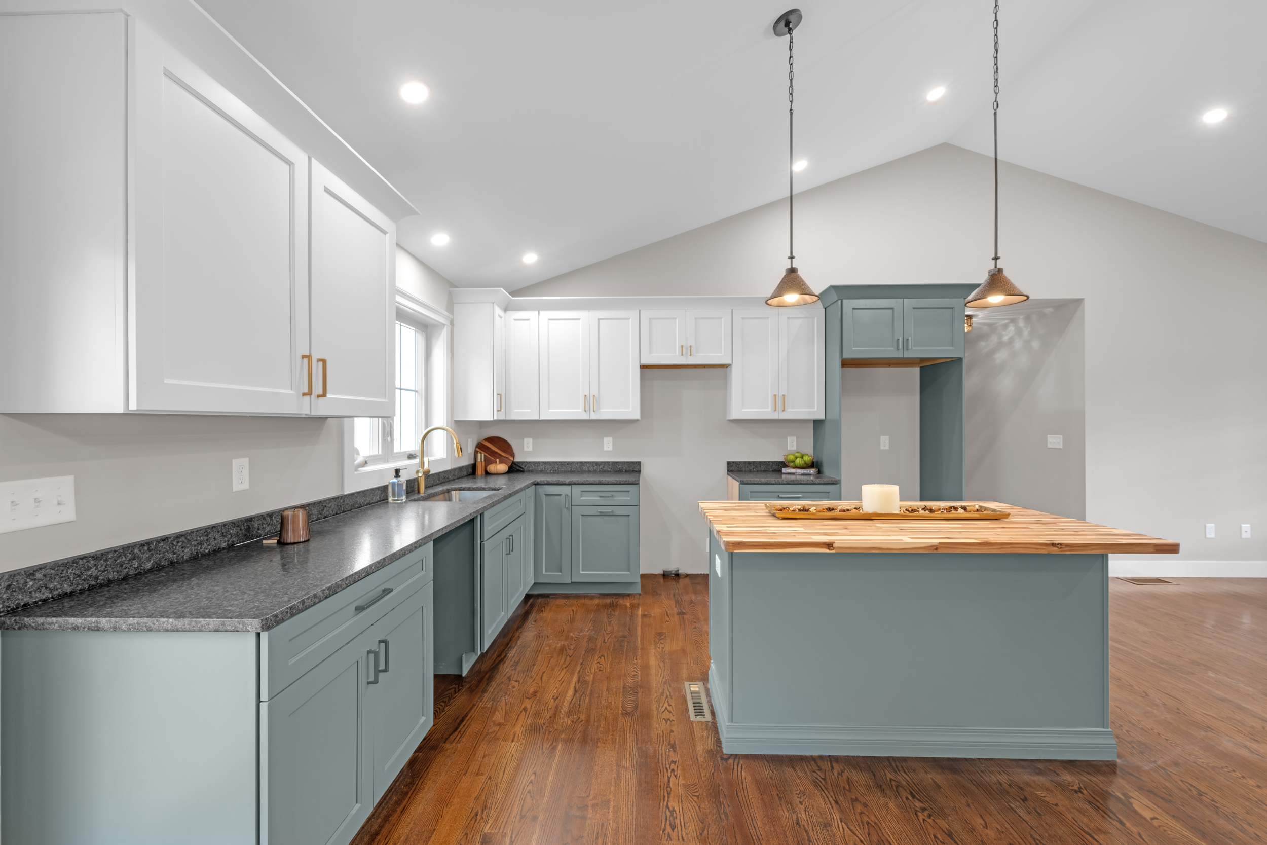 247 Green Hollow Road Killingly, CT 06239 - Photo 11 of 27 a kitchen with stainless steel appliances granite countertop a sink a stove and a wooden floors