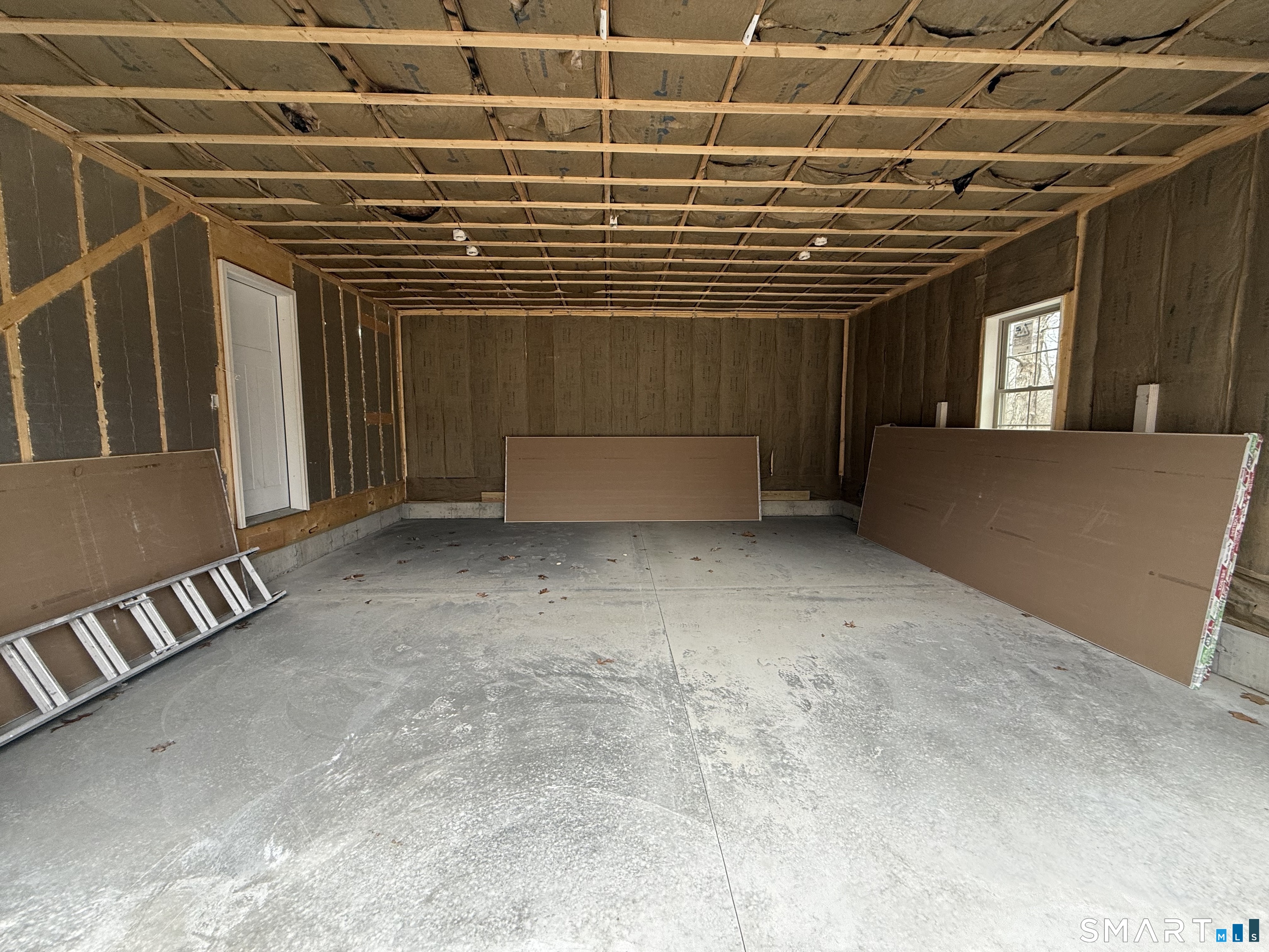 247 Green Hollow Road Killingly, CT 06239 - Photo 12 of 27 a view of an empty room with a window