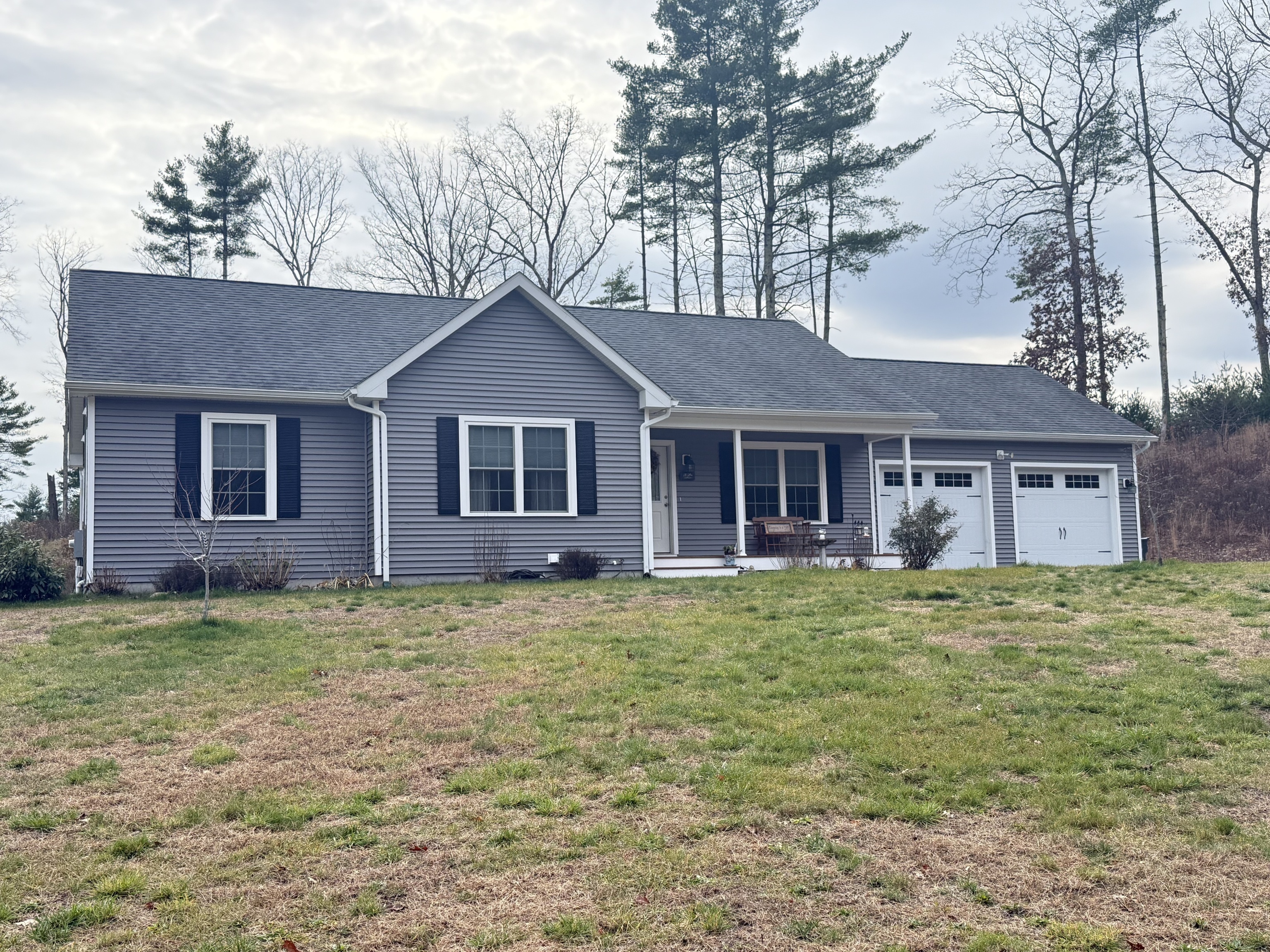 247 Green Hollow Road Killingly, CT 06239 - Photo 13 of 27 a front view of a house with a garden