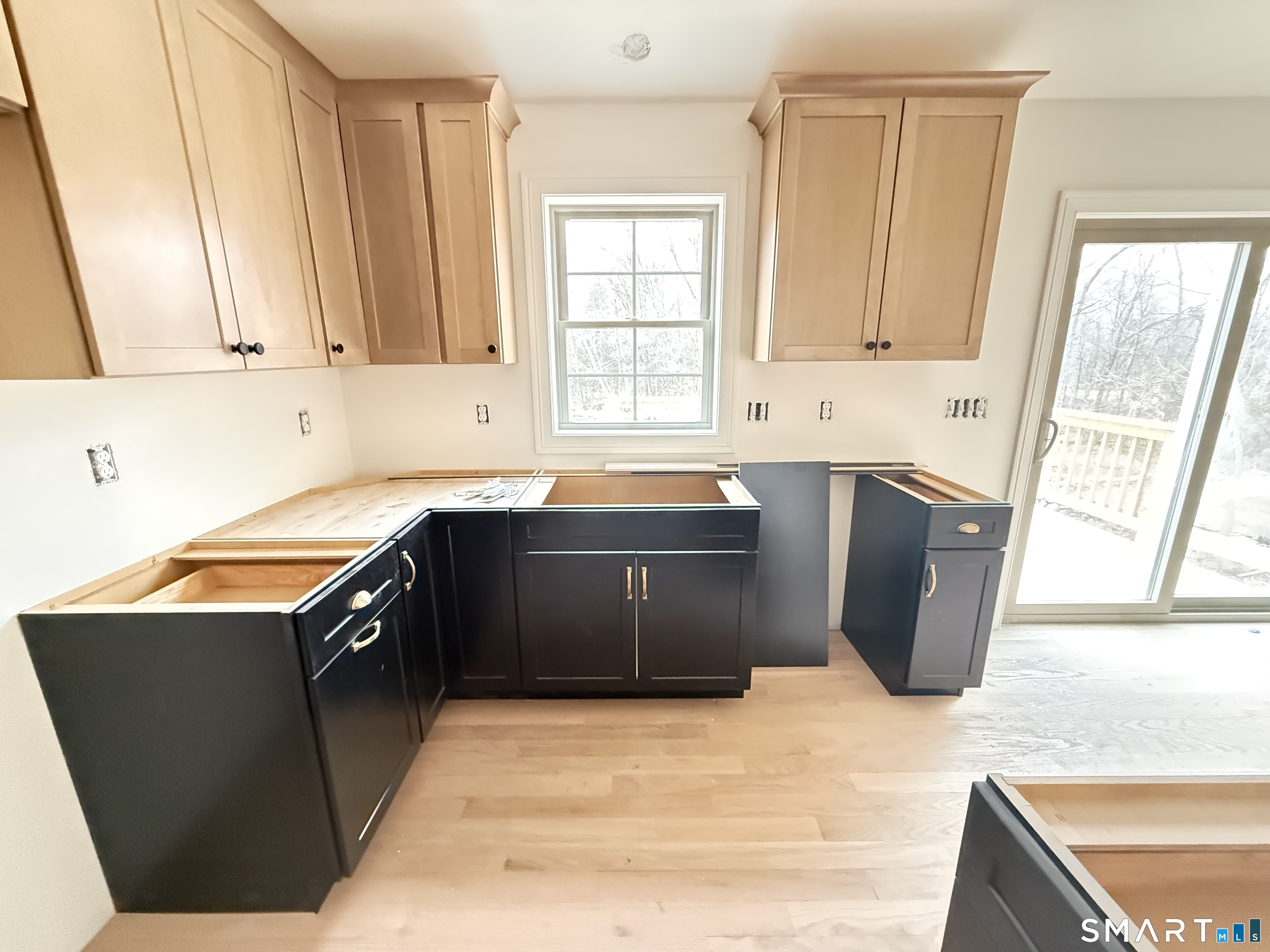 247 Green Hollow Road Killingly, CT 06239 - Photo 16 of 27 a kitchen with stainless steel appliances granite countertop a sink stove and refrigerator