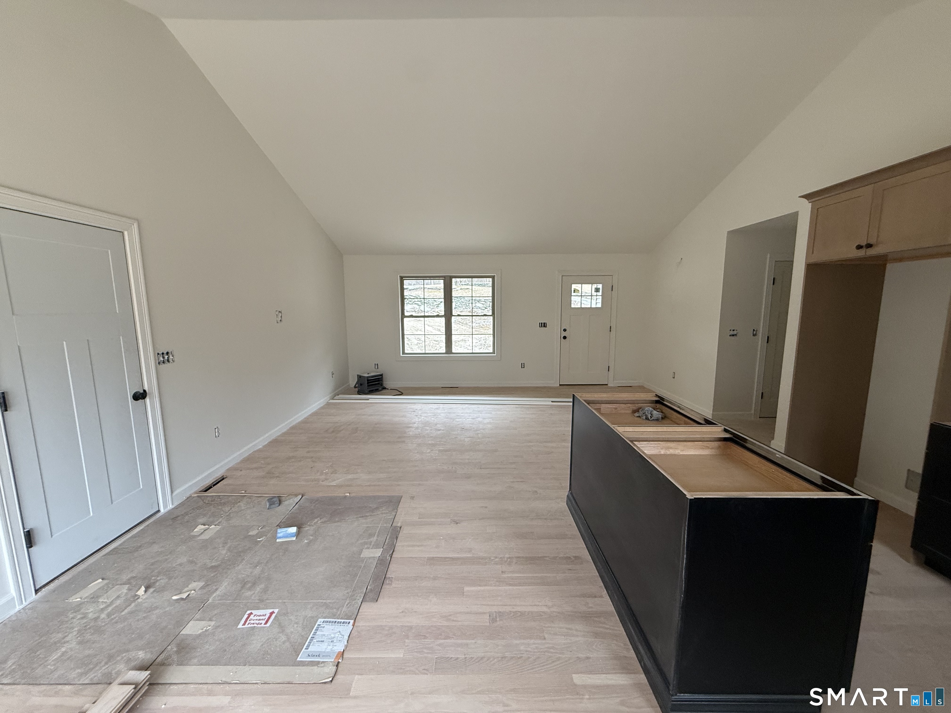 247 Green Hollow Road Killingly, CT 06239 - Photo 18 of 27 a room with window and a table