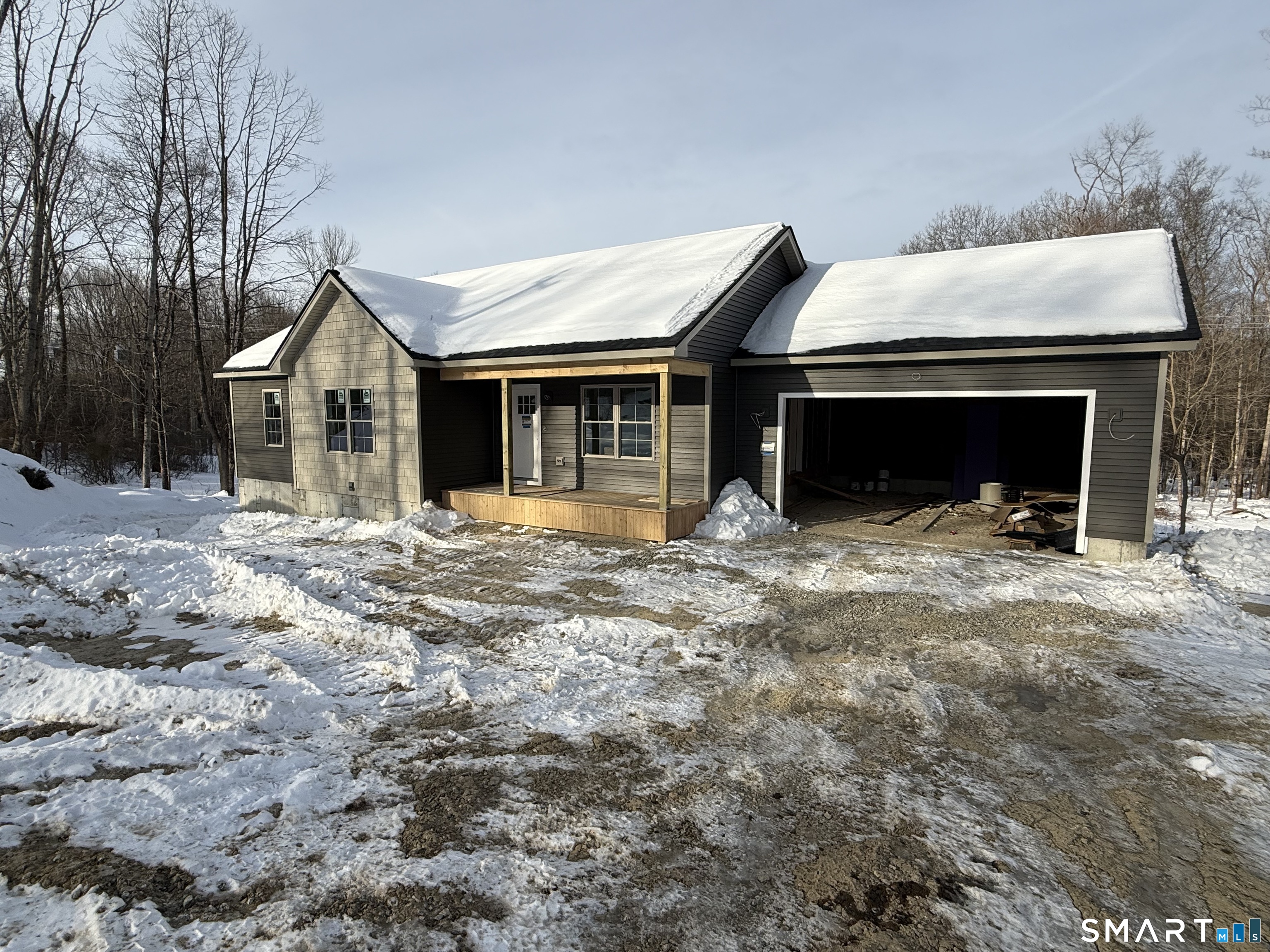 247 Green Hollow Road Killingly, CT 06239 - Photo 2 of 27 a front view of a house with a yard