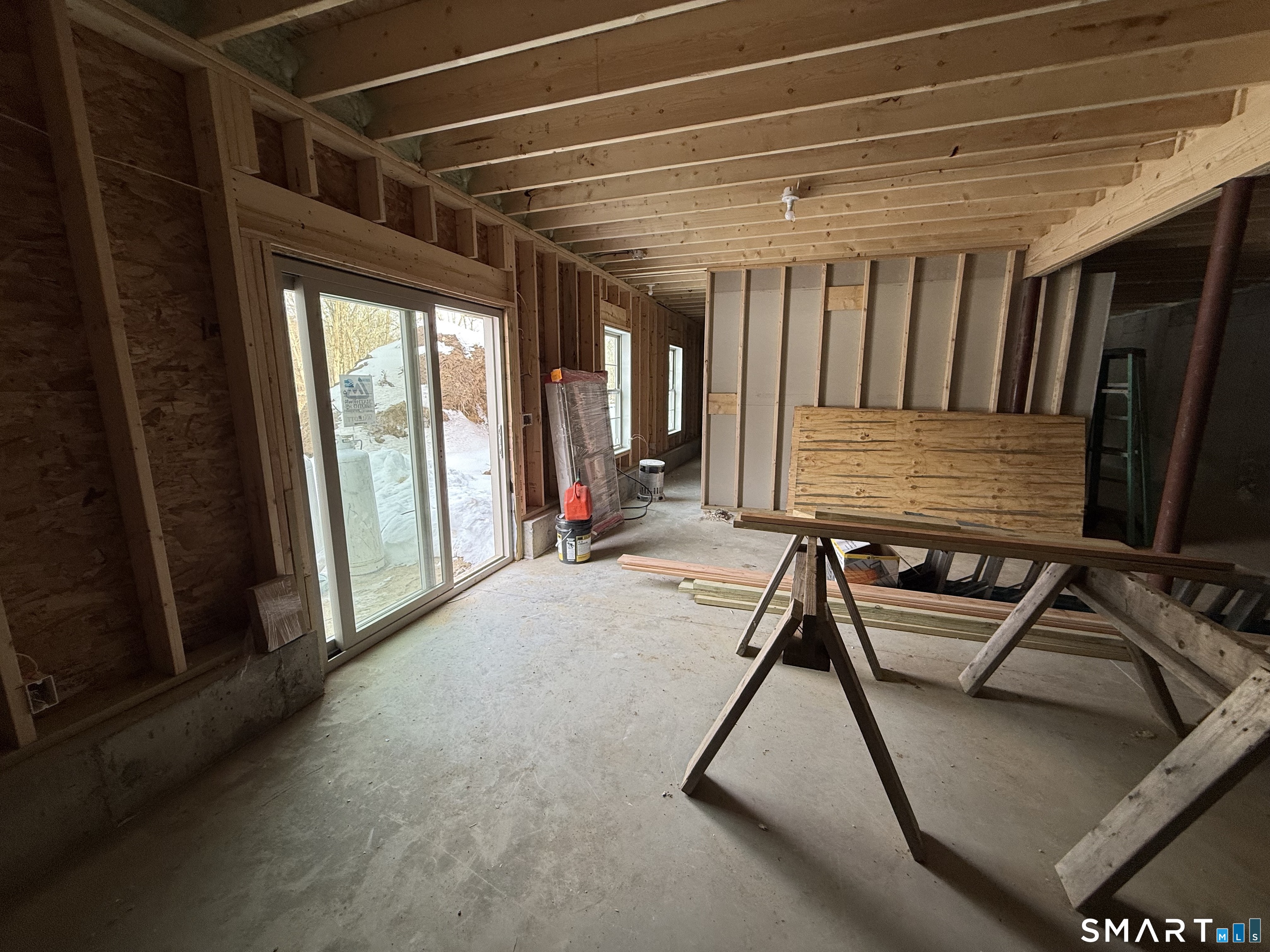 247 Green Hollow Road Killingly, CT 06239 - Photo 5 of 27 a view of a room with furniture and windows