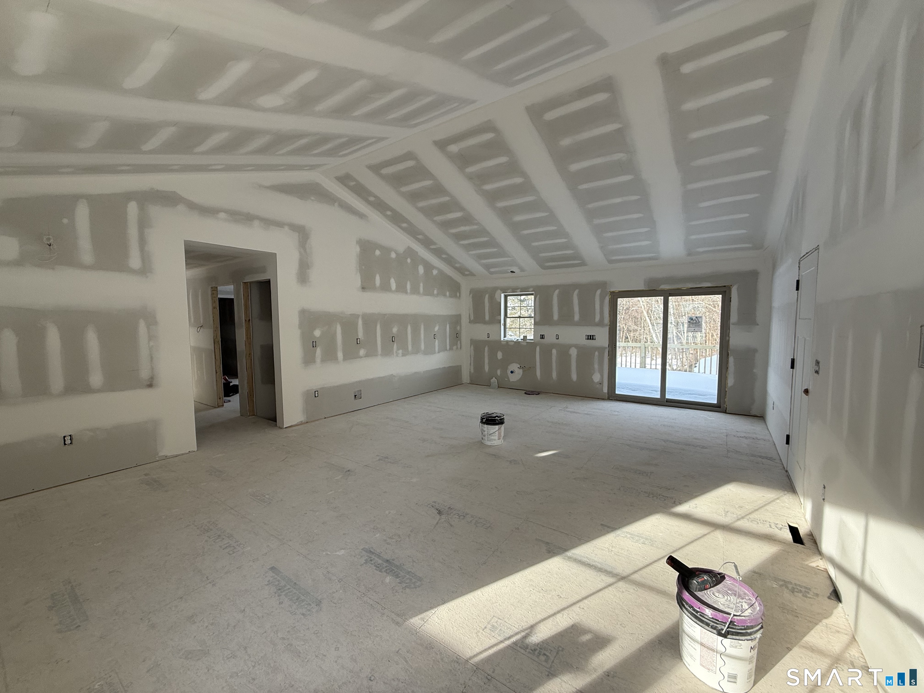 247 Green Hollow Road Killingly, CT 06239 - Photo 6 of 27 a view of an empty room with glass door