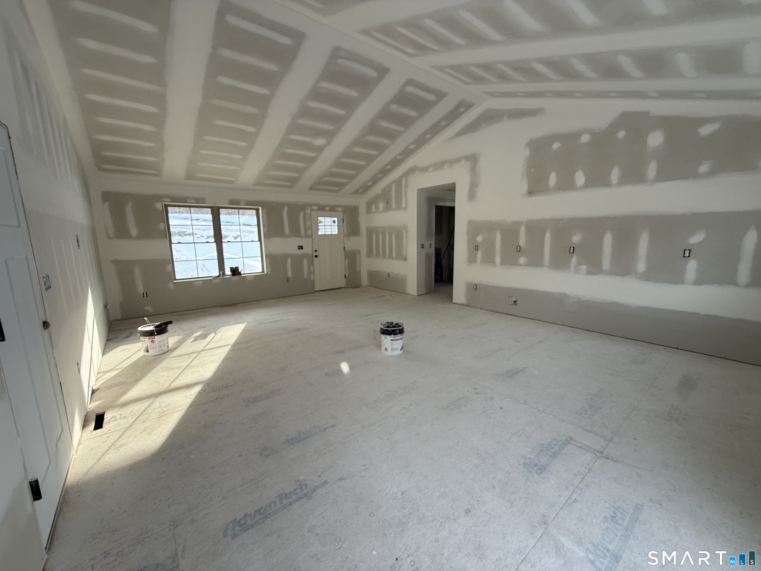 247 Green Hollow Road Killingly, CT 06239 - Photo 8 of 27 a view of an empty room with a window