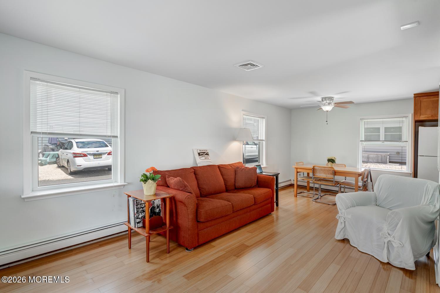 19 Shore Way Lavallette, NJ 08735 - Photo 5 of 38 a living room with furniture and wooden floor