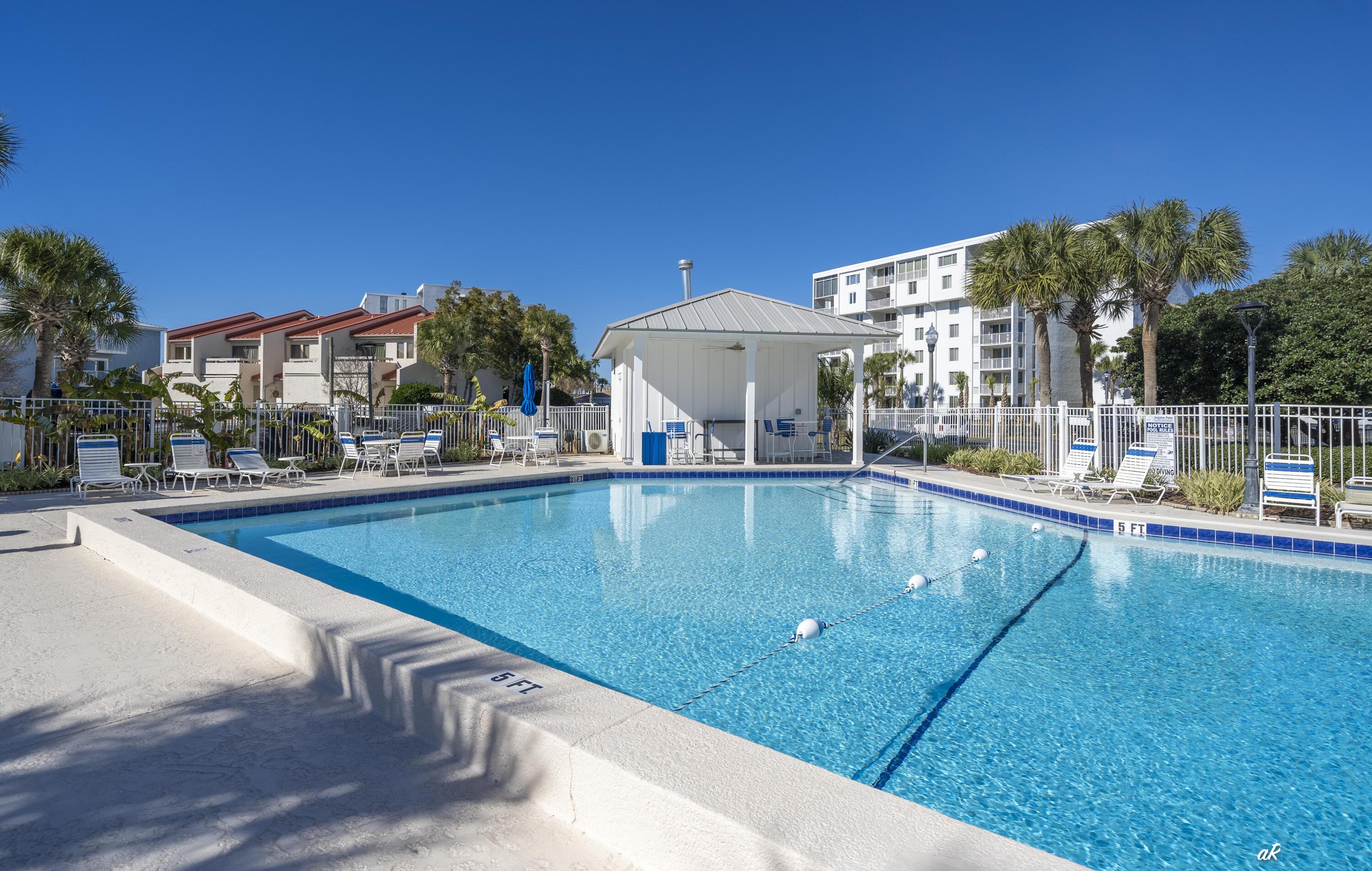 30 Moreno Point Road, Unit 404A Destin, FL 32541 - Photo 46 of 52 a view of swimming pool with outdoor seating