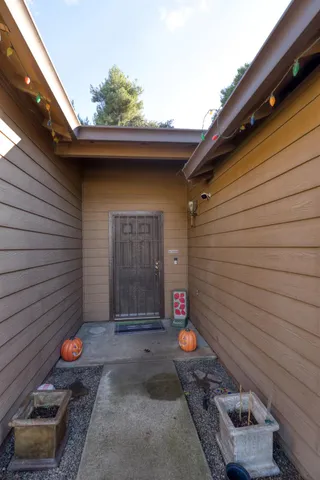 a view of a swimming pool with a patio