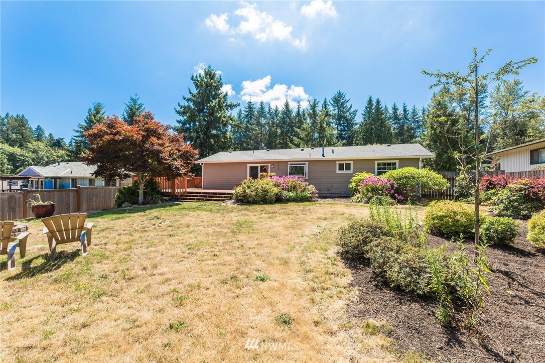 17810 Southeast 121st Place Renton, WA 98059 - Photo 19 of 23 a view of a house with a yard