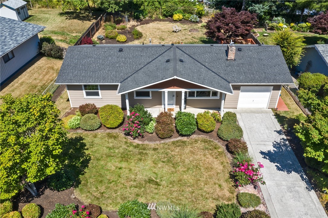 17810 Southeast 121st Place Renton, WA 98059 - Photo 3 of 23 a aerial view of a house with a yard and garden