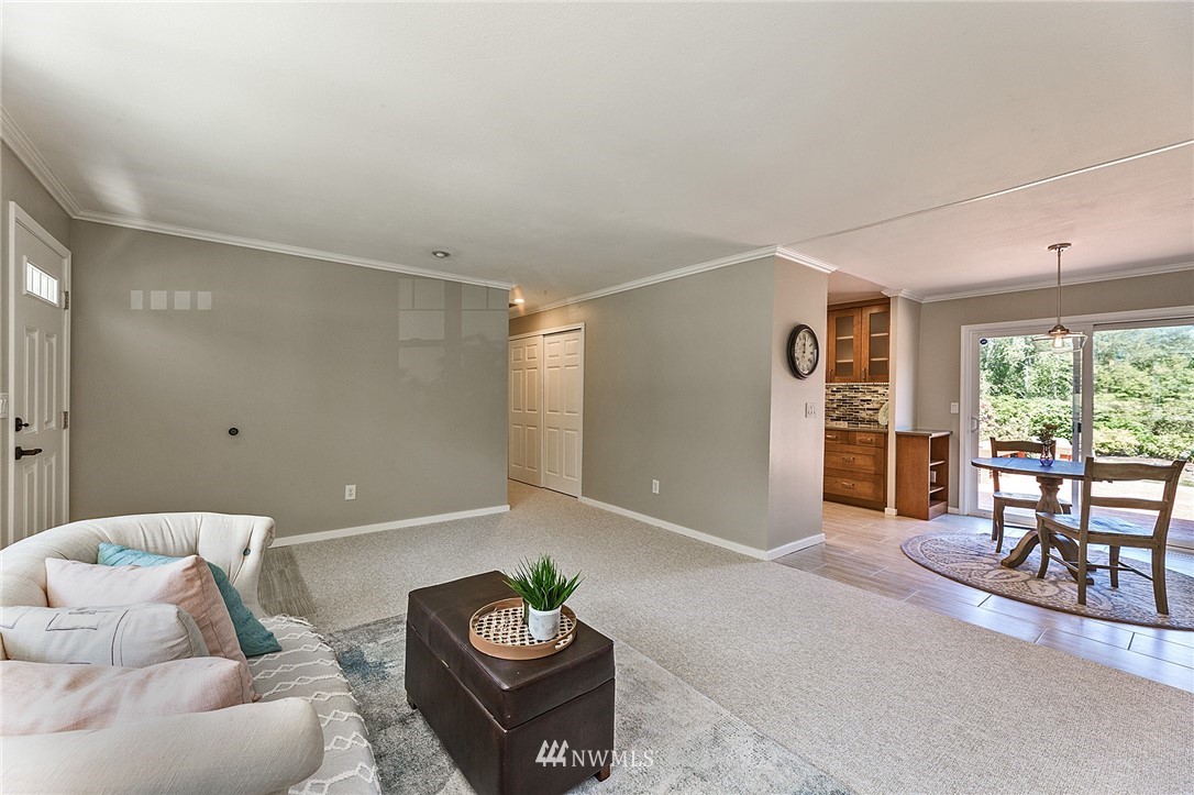 17810 Southeast 121st Place Renton, WA 98059 - Photo 6 of 23 a living room with furniture and a table