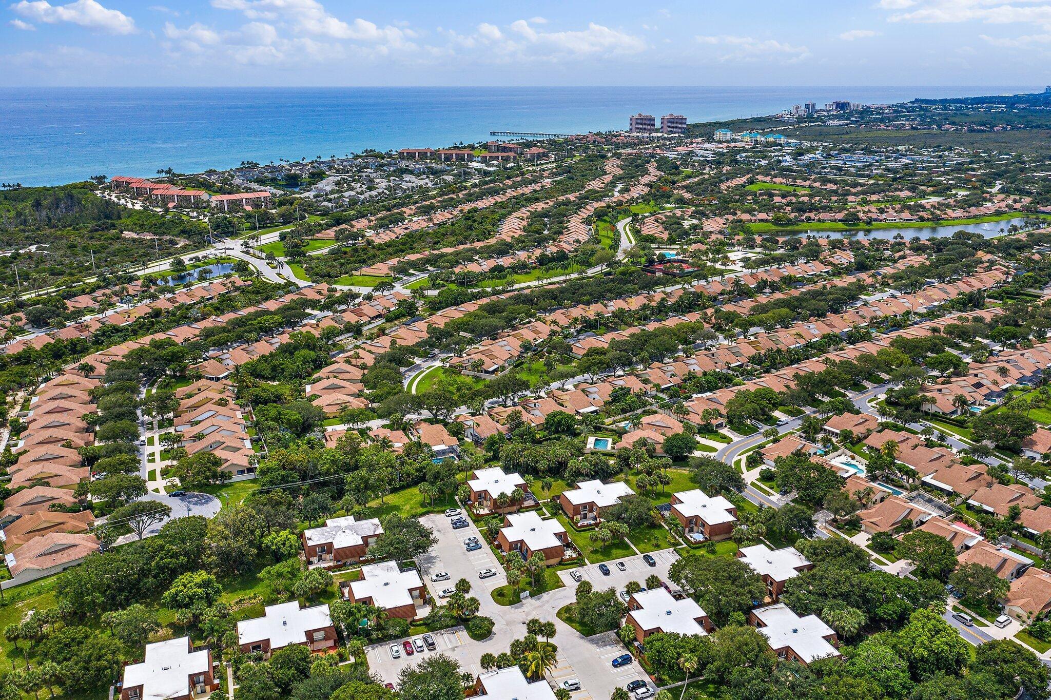 2410 24th Court Jupiter, FL 33477 - Photo 3 of 33 an aerial view of multiple house