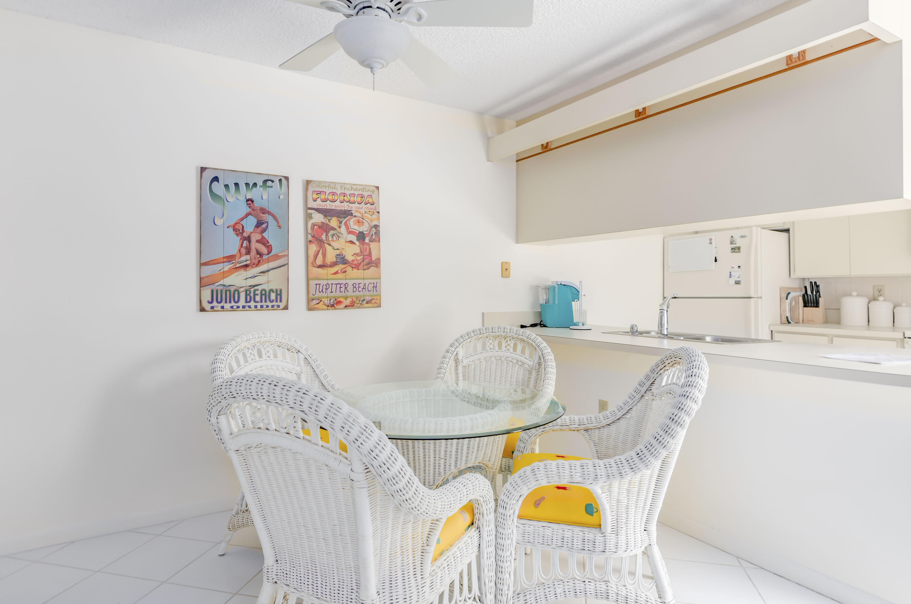 2410 24th Court Jupiter, FL 33477 - Photo 7 of 33 a living room with furniture and a table