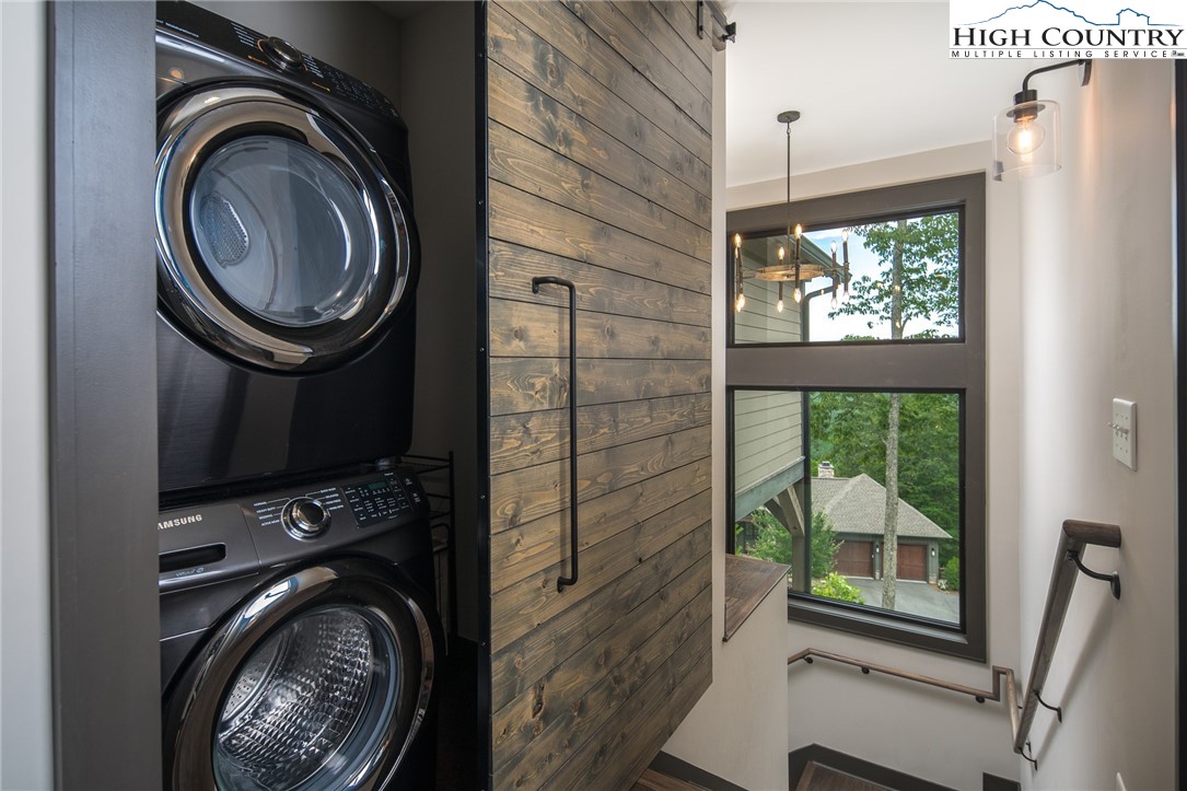 137 Sweetspire Lane Boone, NC 28607 - Photo 12 of 50 a view of a bedroom with washer and dryer