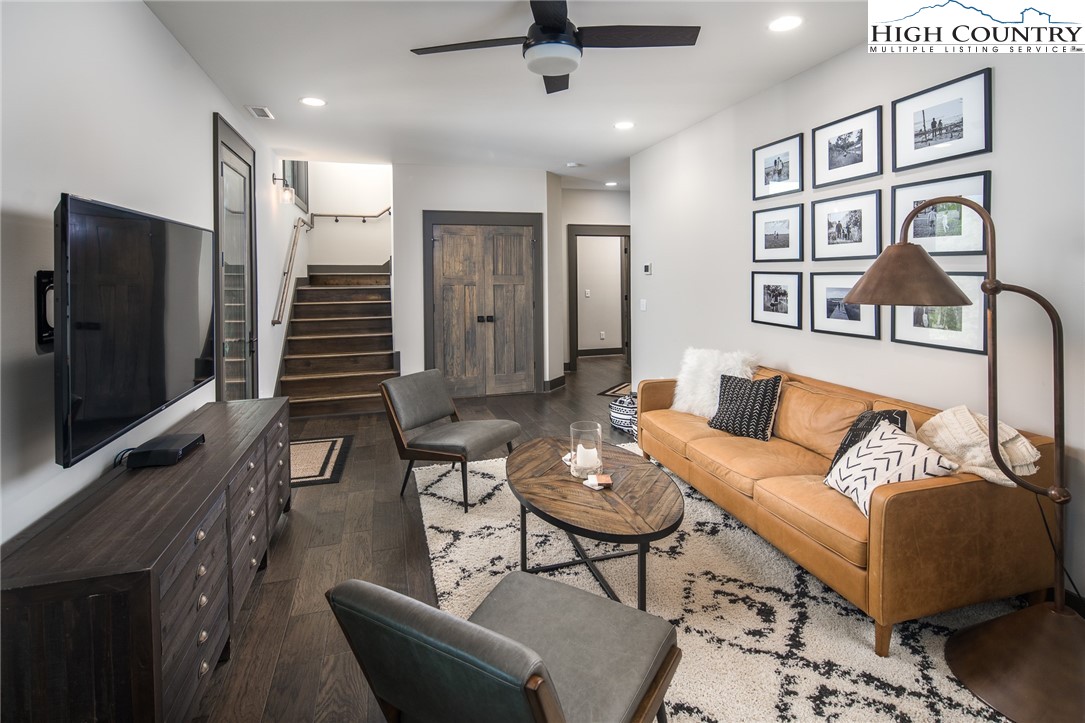 137 Sweetspire Lane Boone, NC 28607 - Photo 19 of 50 a living room with furniture and wooden floor