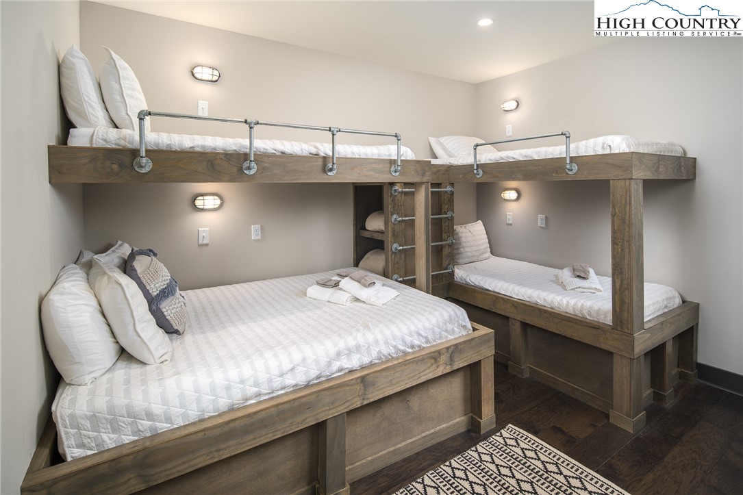 137 Sweetspire Lane Boone, NC 28607 - Photo 20 of 50 a bedroom with a bed and cabinets