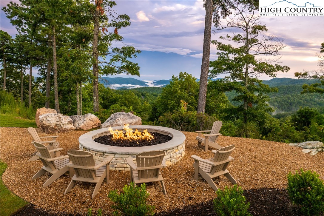 137 Sweetspire Lane Boone, NC 28607 - Photo 50 of 50 a backyard of a house with wooden floor yard and outdoor seating