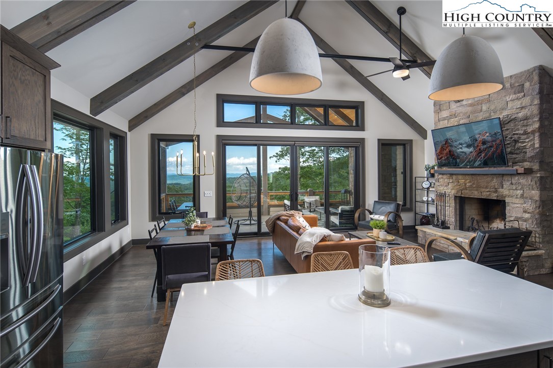 137 Sweetspire Lane Boone, NC 28607 - Photo 5 of 50 a living room with furniture large window and outer view