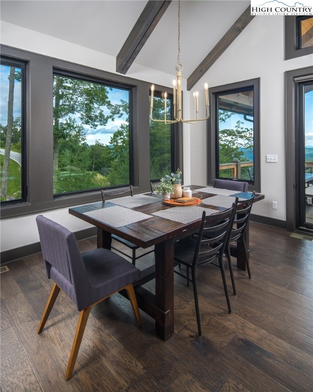 137 Sweetspire Lane Boone, NC 28607 - Photo 6 of 50 a view of a dining room with furniture window and wooden floor