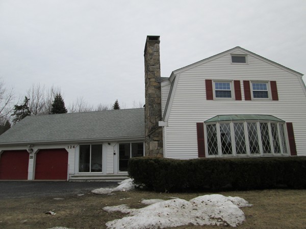 124 East County Road Rutland, MA 01543 - Photo 1 of 22 a front view of a house with a yard