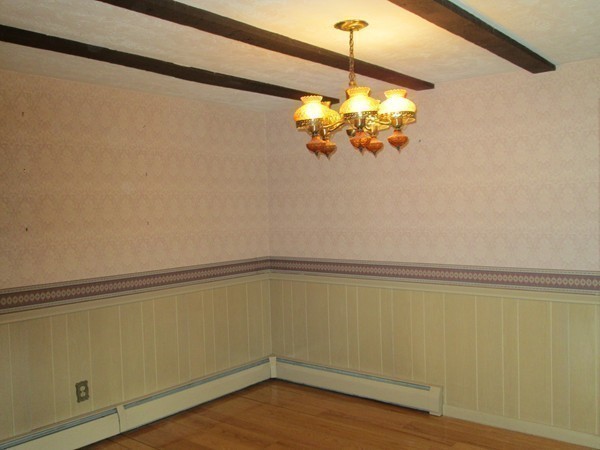 124 East County Road Rutland, MA 01543 - Photo 10 of 22 a view of a room with wooden floor and white walls