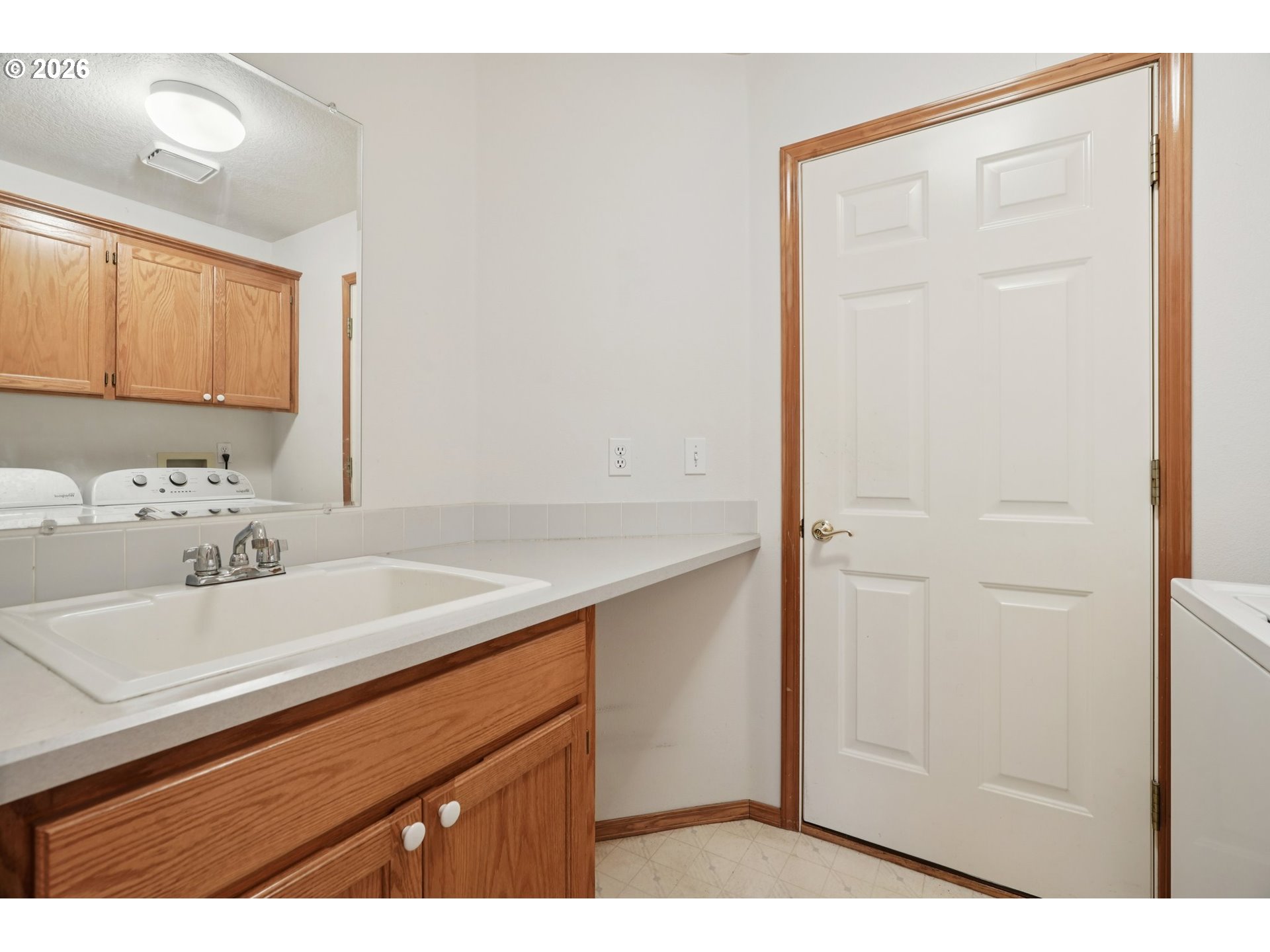 19862 Castleberry Loop Oregon City, OR 97045 - Photo 24 of 33 a bathroom with a sink and a mirror