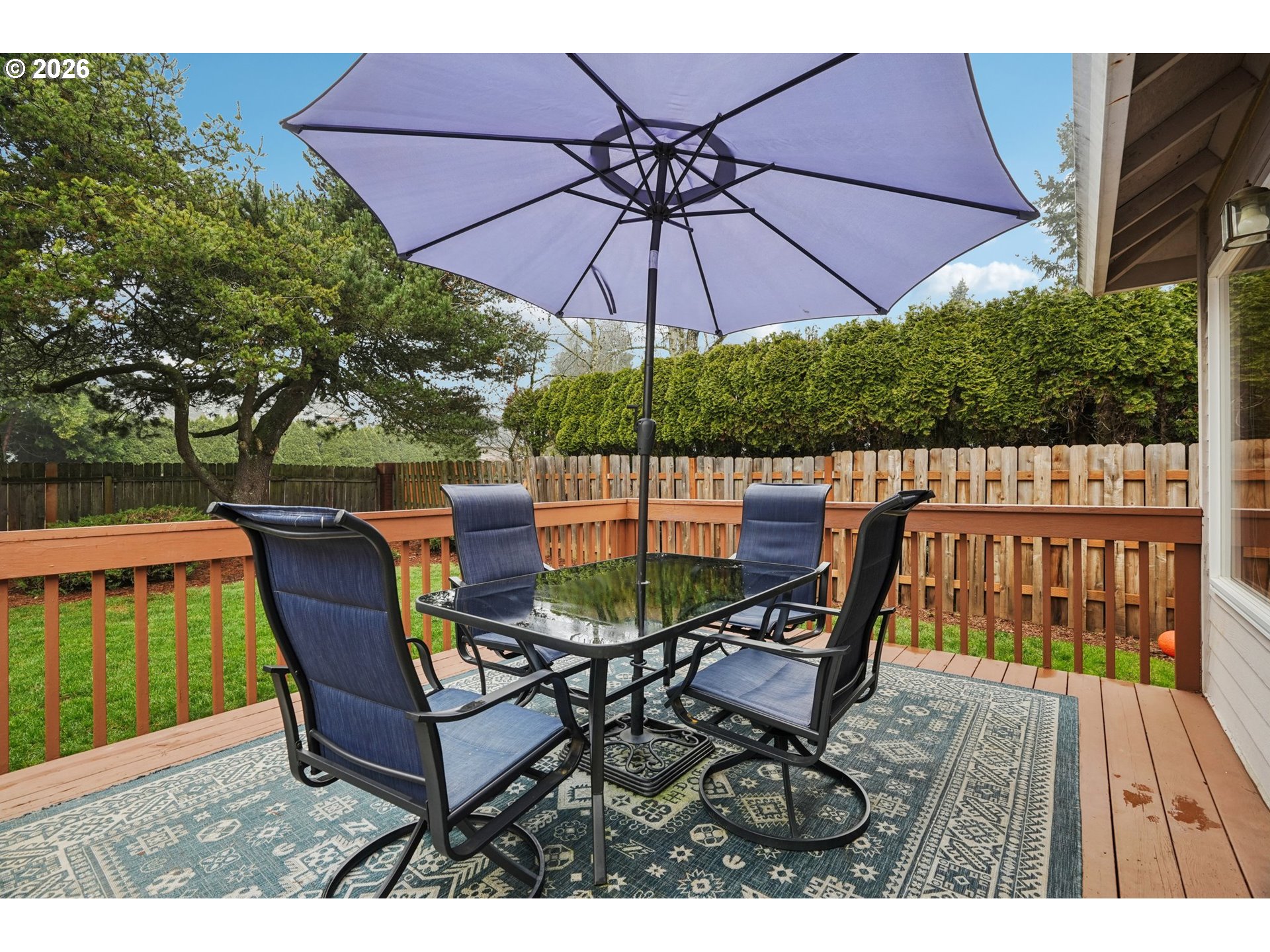19862 Castleberry Loop Oregon City, OR 97045 - Photo 26 of 33 a view of a chair and table in the patio