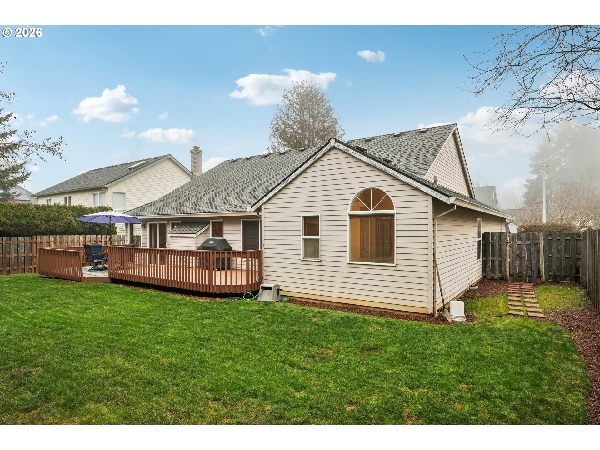 19862 Castleberry Loop Oregon City, OR 97045 - Photo 27 of 33 a view of a house with a yard