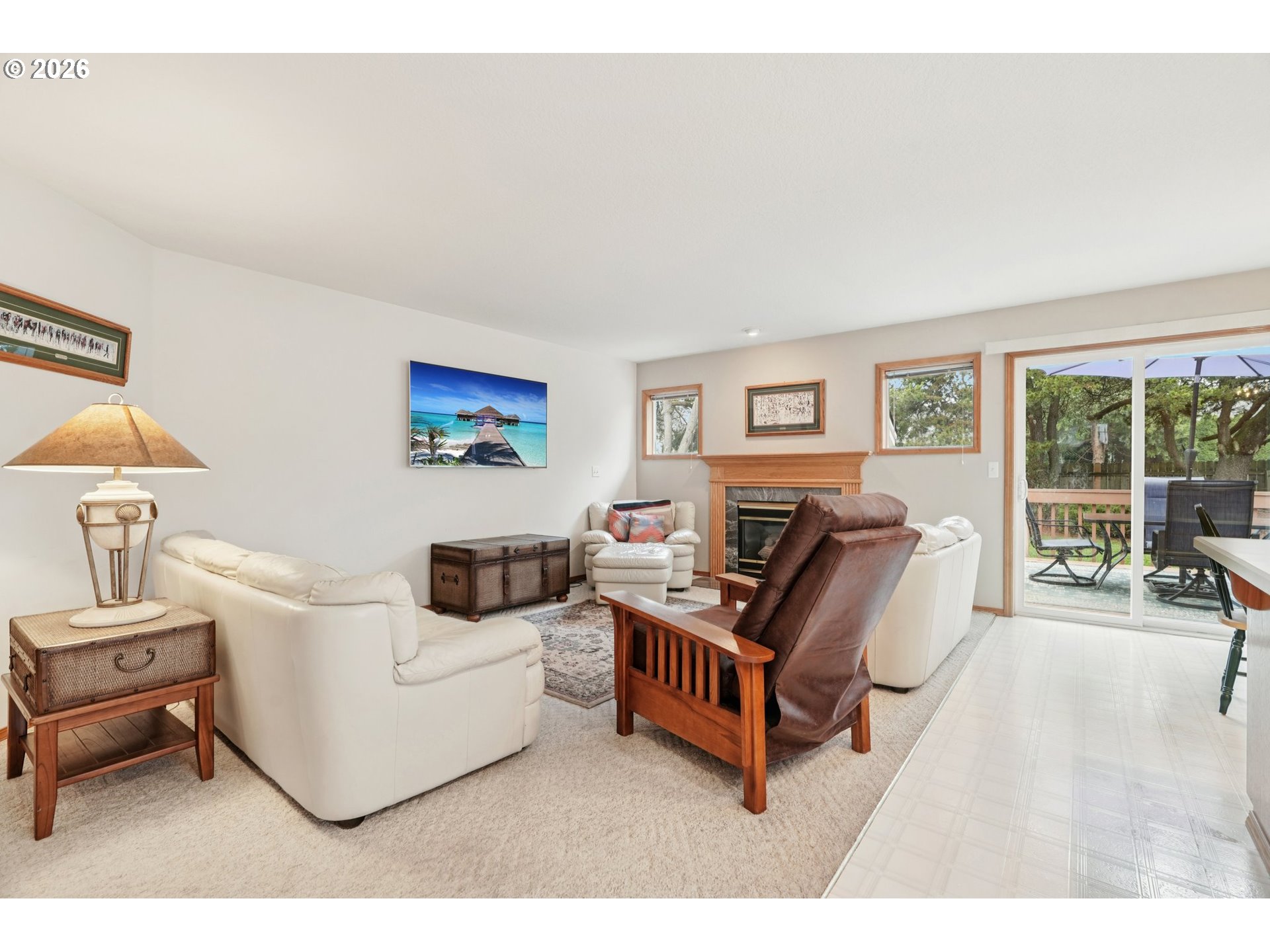 19862 Castleberry Loop Oregon City, OR 97045 - Photo 3 of 33 a living room with furniture and a flat screen tv