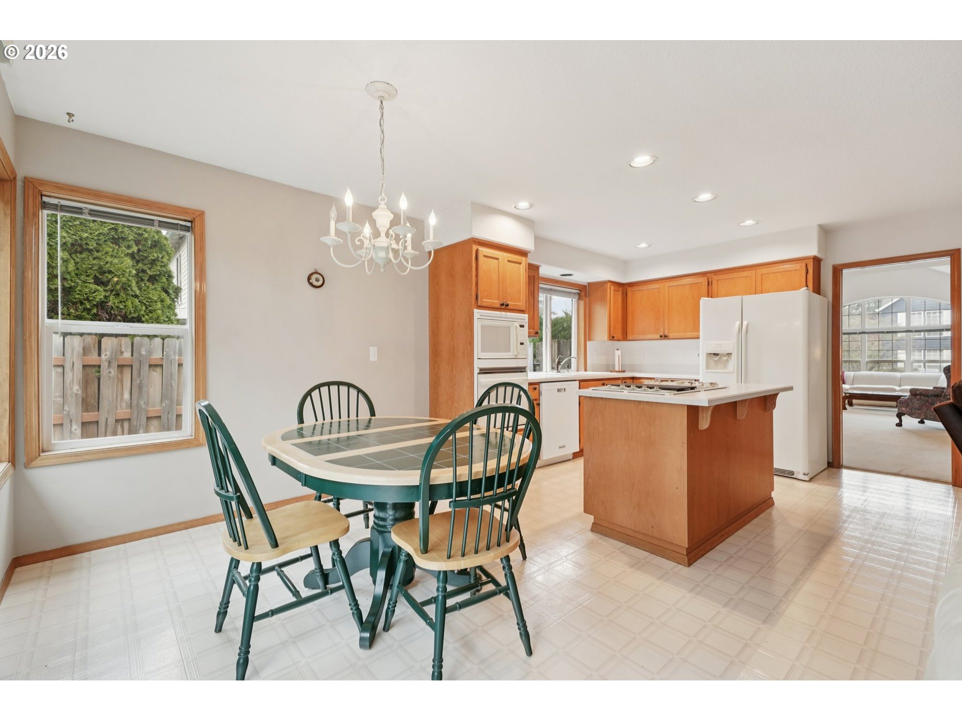 19862 Castleberry Loop Oregon City, OR 97045 - Photo 9 of 33 a view of a dining room with furniture window and outside view