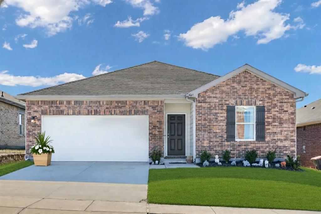 801 Peach Tree Lane Anna, TX 75409 - Photo 1 of 14 a front view of a house with garden